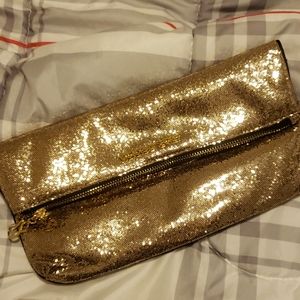 Gold clutch VS
